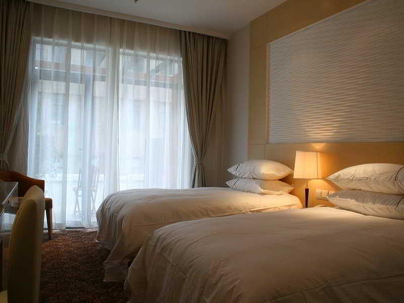 Shanghai Baron Business Bund Hotel Habitación foto